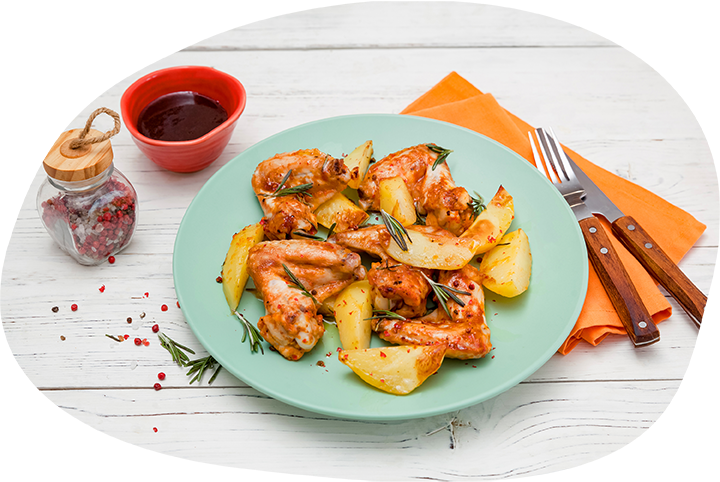 Запеченные куриные крылья с картофелем